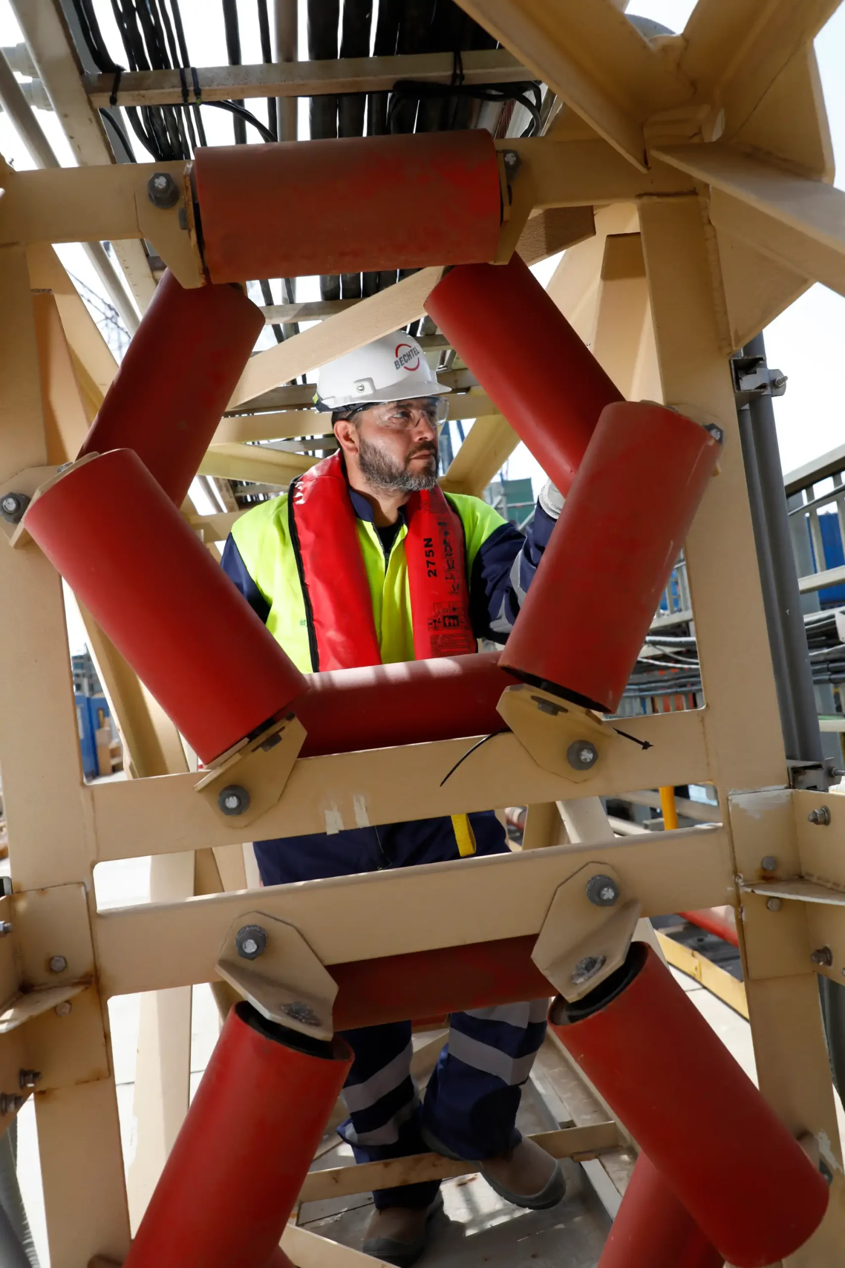 Worker inside the belt system.